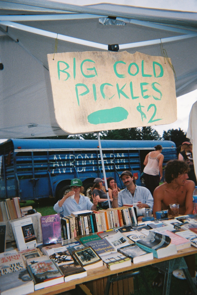 Booksellers sell books and pickles at the fest.
